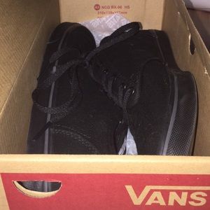 Black Canvas Vans, lightly worn.